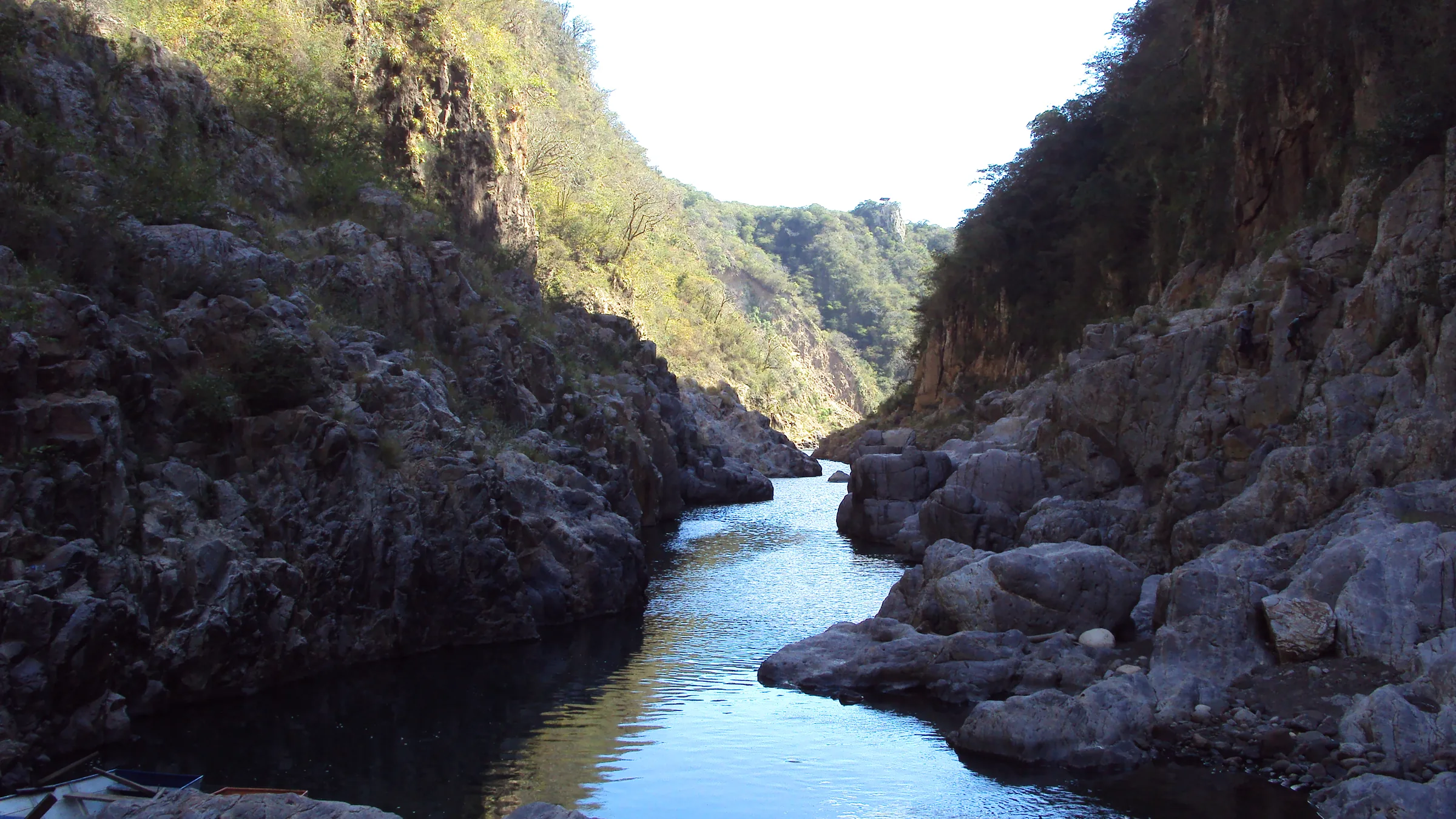 River between high rock walls in Somoto Canyon.