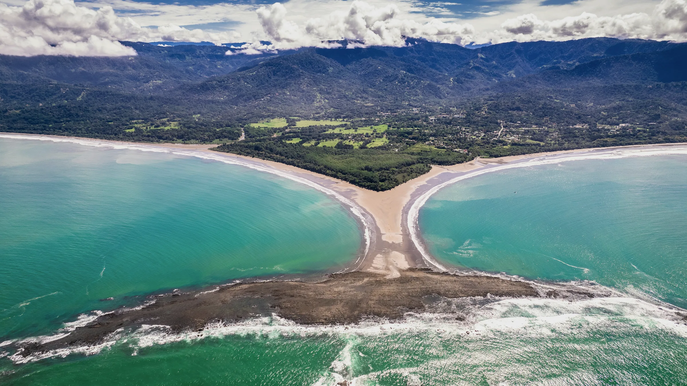 Aerial view of the Punta Uvita sandbar and its two bays.