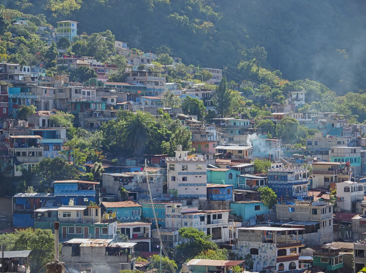 Hillside houses painted blue and other colours in Santa Catarina Palopó.