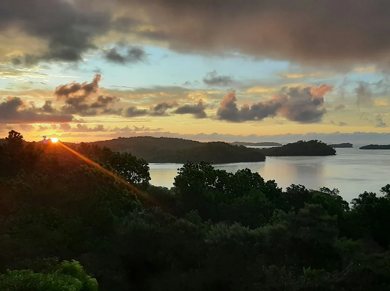 Sunset over the sea and islands seen from Boca Chica.