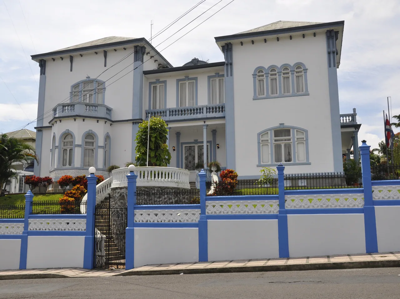 White and blue facade of Castillo Azul in San José.