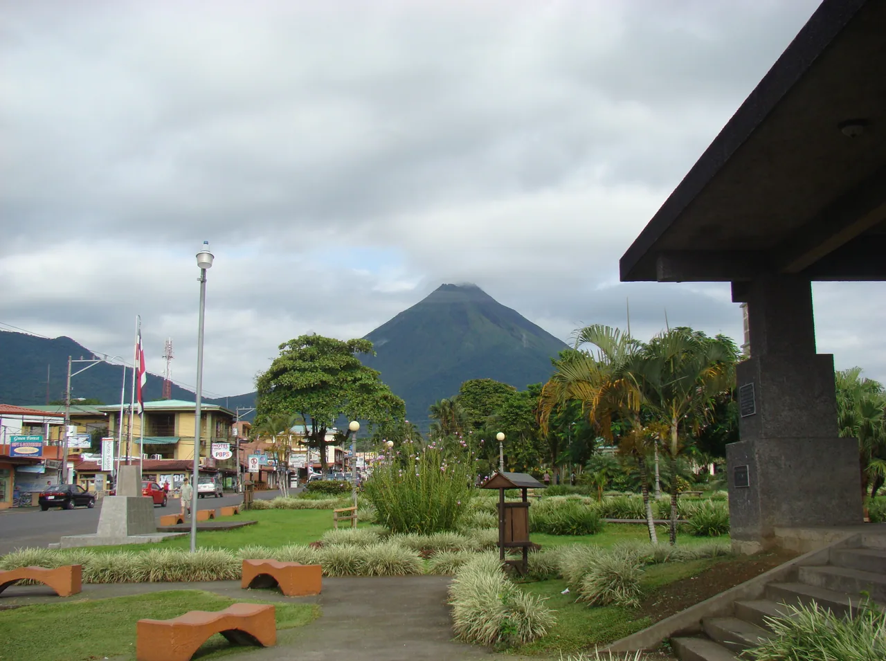 Gardens in La Fortuna’s central park with Arenal volcano in the background.