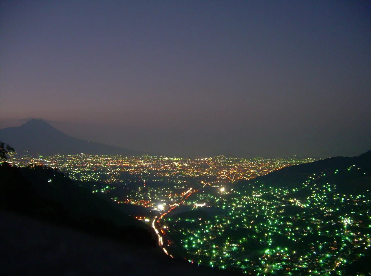 San Salvador lights at dusk seen from Los Planes de Renderos.
