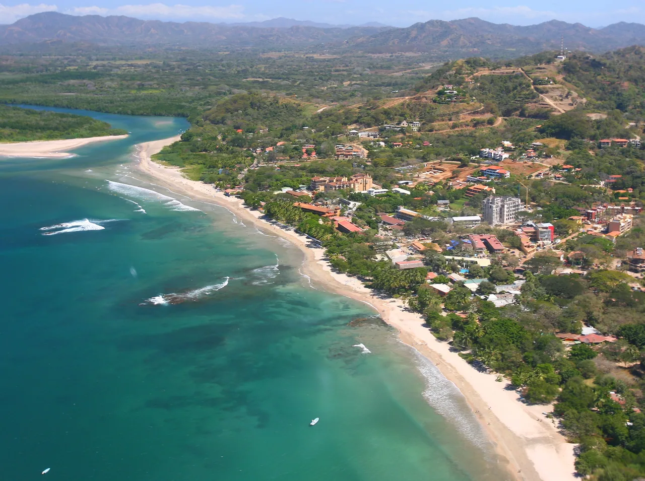 Aerial view of the river mouth and beach at Tamarindo.